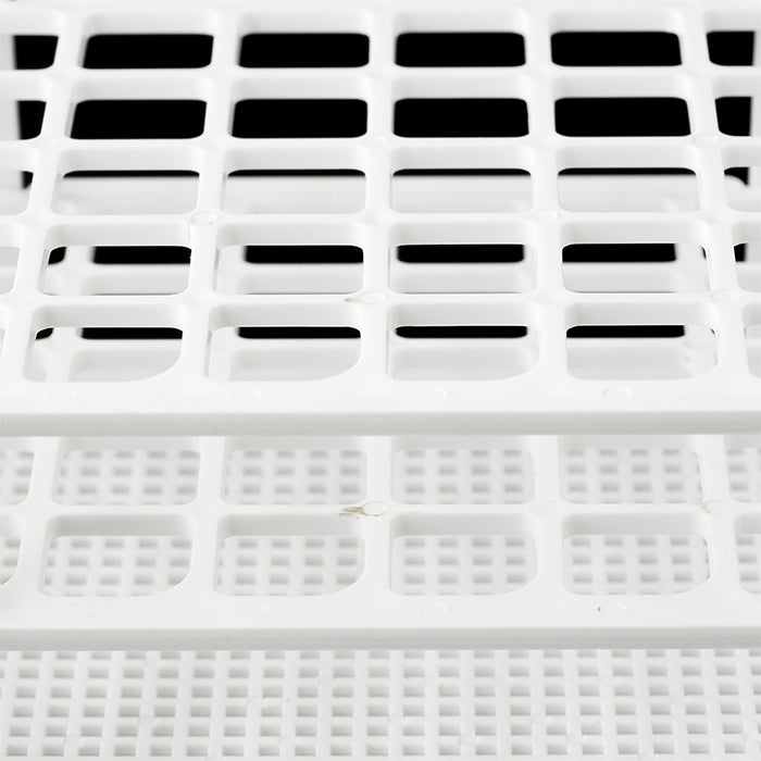 Close up of collapsible polypropylene test tube rack with 21 openings.