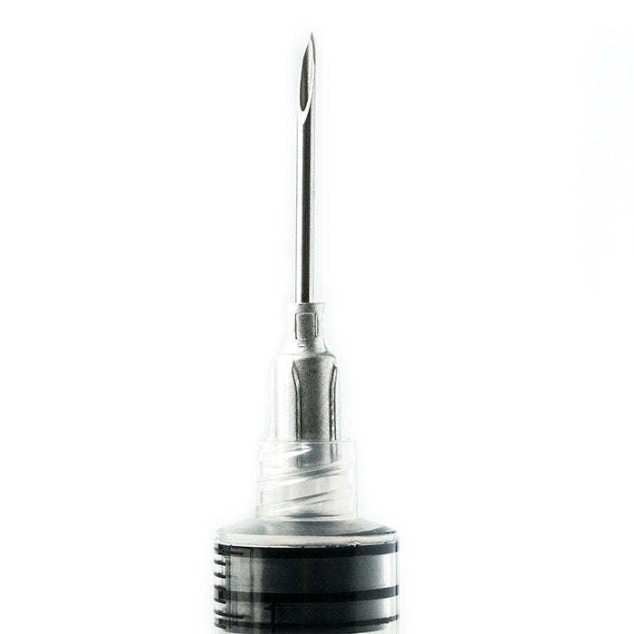 1 inch poly luer lock syringe needle on syringe