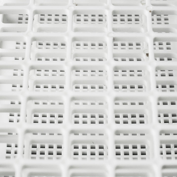 Close up of collapsible polypropylene test tube rack with 21 openings.